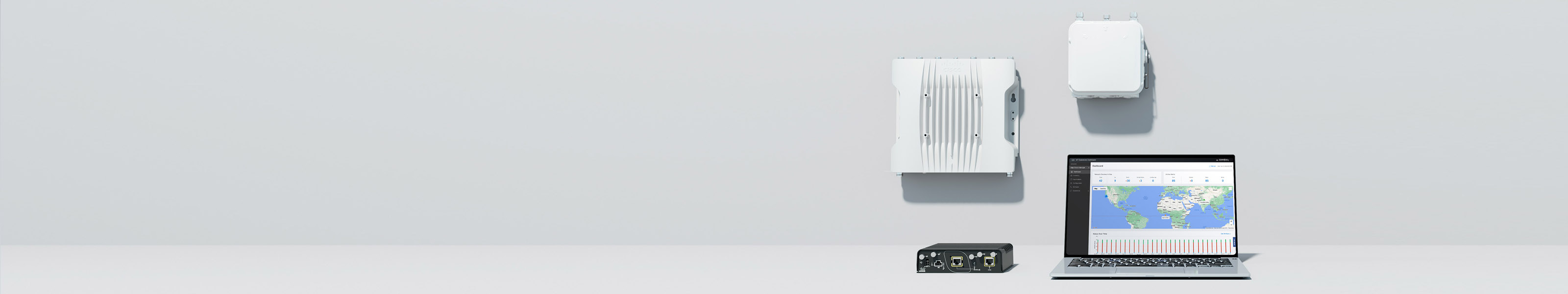 "Cisco IW9165E, IW9167E, IW9165D, and a laptop displaying a management tool interface