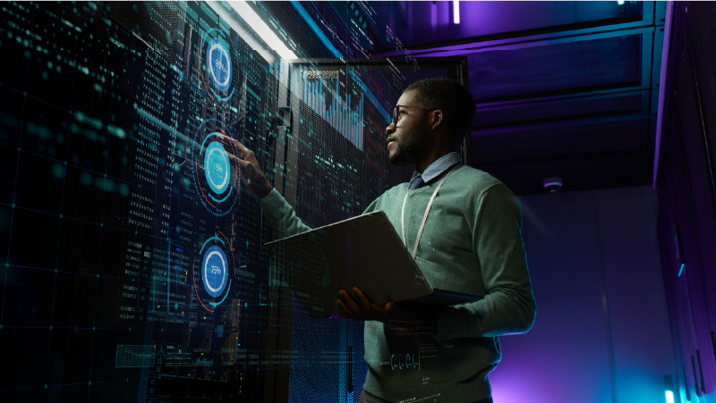 Man standing in a data center 