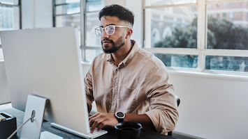 Man working at desktop computer