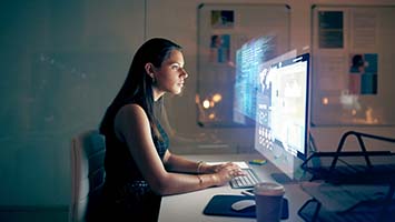 Women working on computer in office